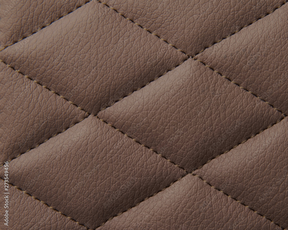 Fototapeta premium Macro leather pattern background. Synthetic leatherette surface.