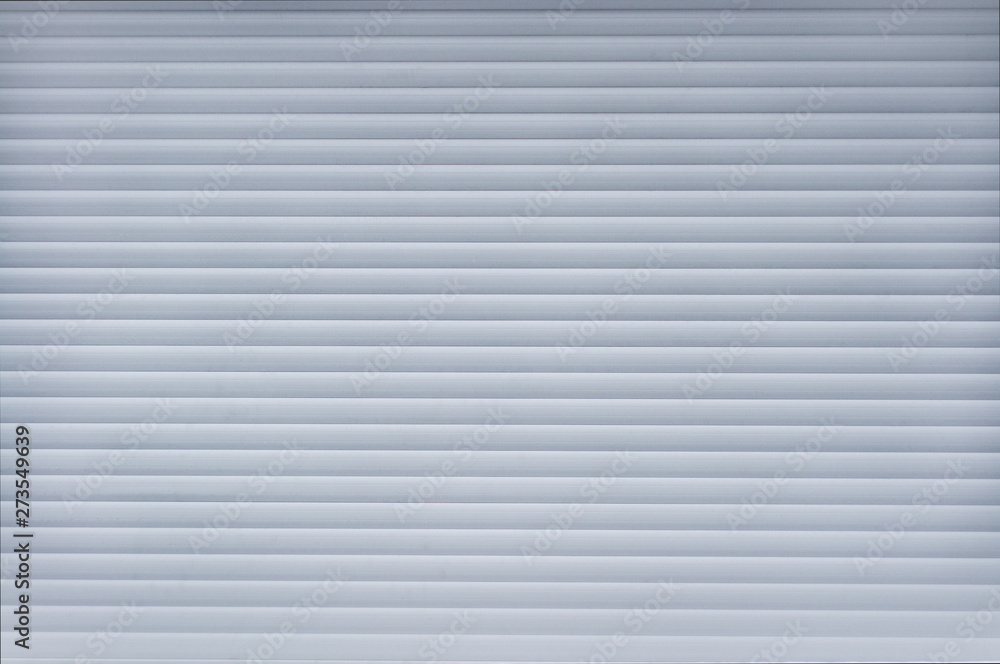 Closed gray blinds. The background image Closed gray blinds. The background image
