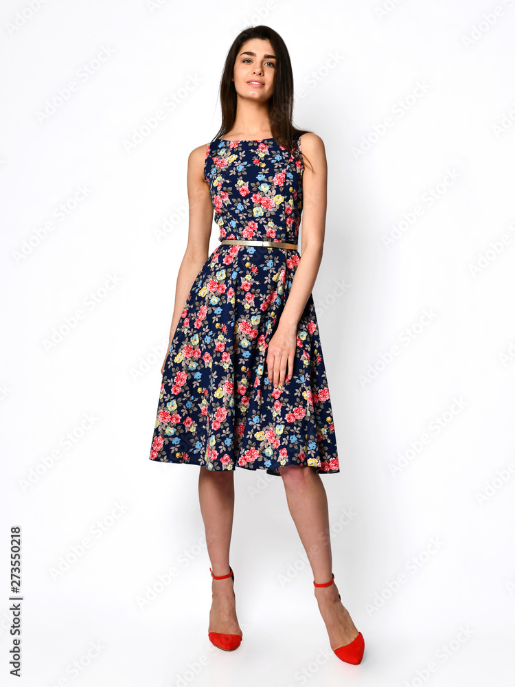 Young beautiful woman walking in new design casual summer long dress full body on white Young beautiful woman walking in new design casual summer long dress full body on white