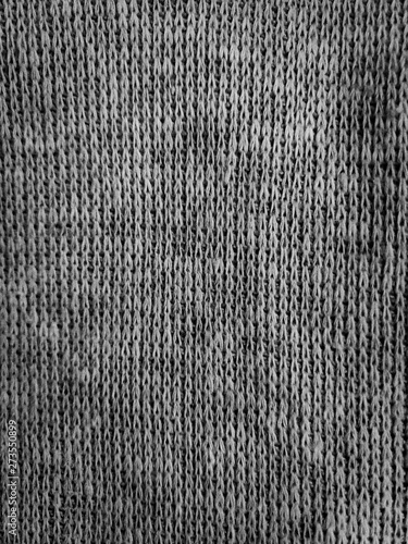 Grey, black and white knit fabric background texture