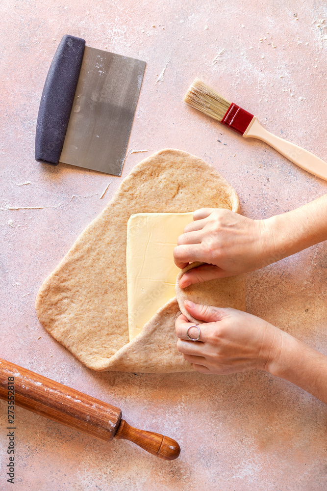 Female hands laminating puff pastry Stock Photo Adobe Stock