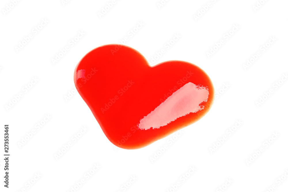 Heart shaped tomato sauce isolated on white