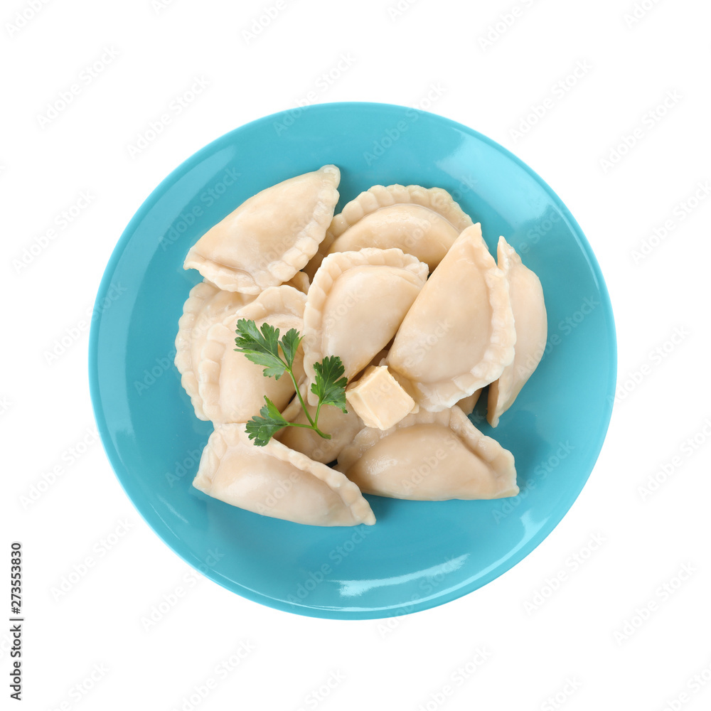 Plate of tasty dumplings served with parsley and butter on white background, top view Plate of tasty dumplings served with parsley and butter on white background, top view