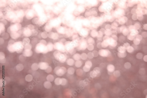 Blurred view of color glitter as background