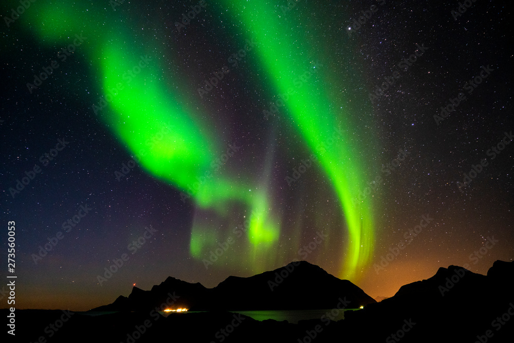 Aurora borealis over the mountains of Lofoten, Norway.