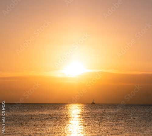 Ocean sunset sailboat © David