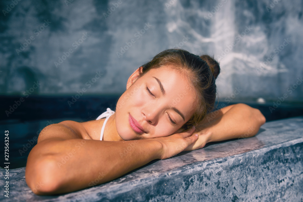 Wellness pool spa pampering Asian woman relaxing in luxury resort. Hot tub  jacuzzi at hotel holiday weekend getaway. Stock Photo | Adobe Stock