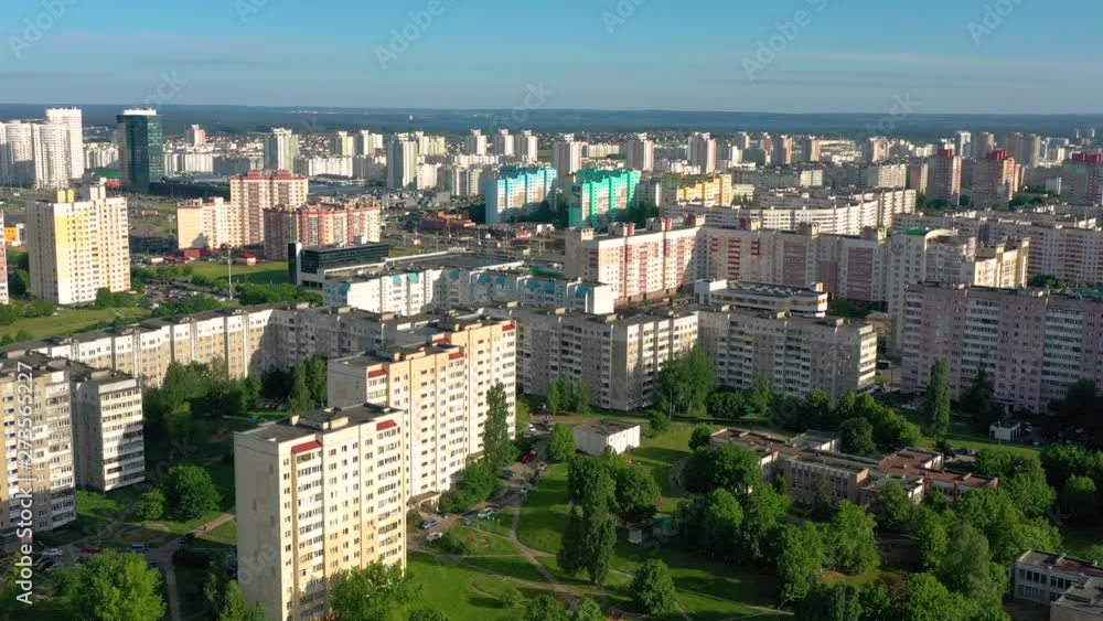 MINSK, BELARUS - JUNE, 2019: Aerial drone shot view of city suburbs. Streets from above at sunny day. MINSK, BELARUS - JUNE, 2019: Aerial drone shot view of city suburbs. Streets from above at sunny day.