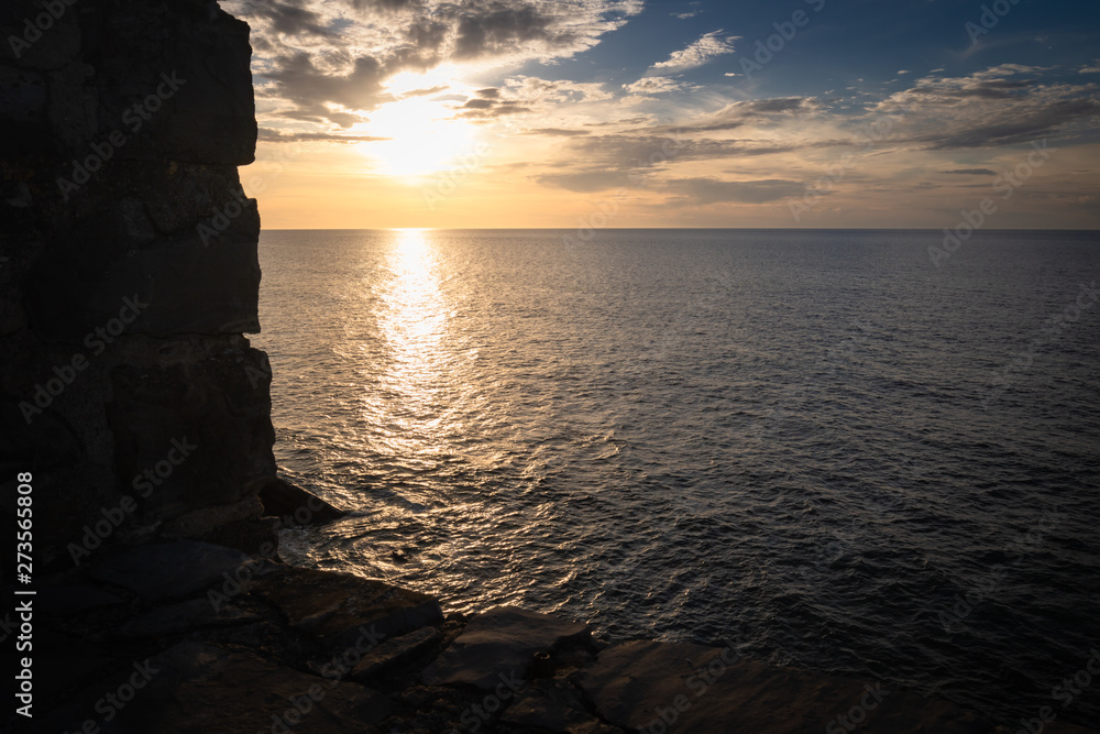 Fototapeta premium scenic view with sunset on atlantic ocean with rocks in socoa, basque country, france