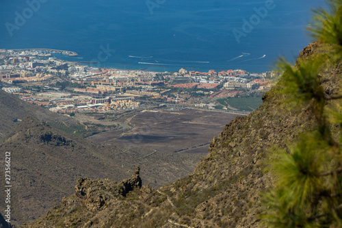 Top view of the gorgeous city of Las Americas, General turistic center in the south coast line. Long focuse lens. Ifonche mountains. Tenerife. Canary Islands. Spain