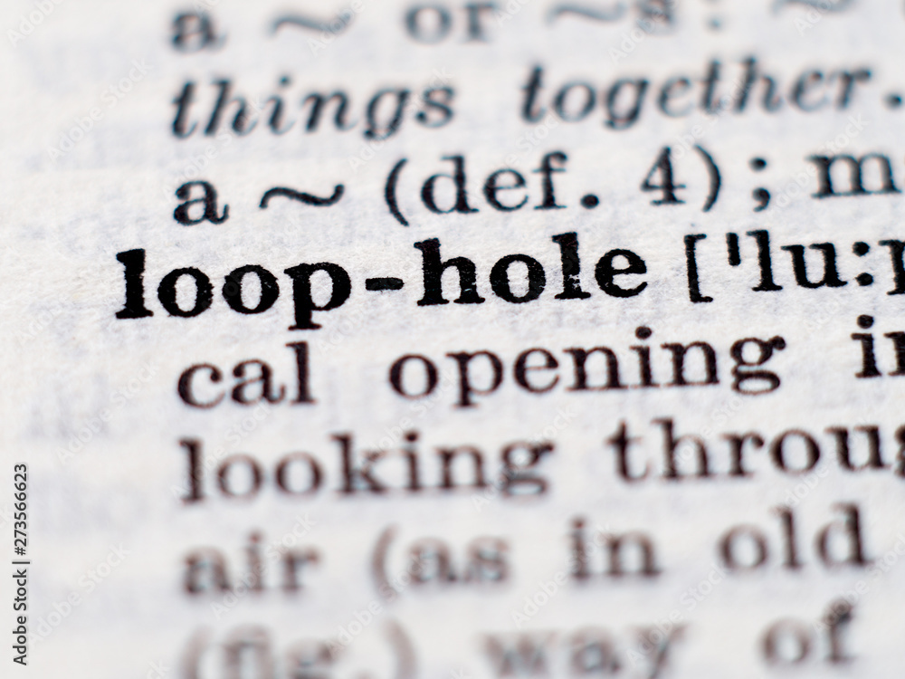 Dictionary definition of word loophole. Selective focus. Dictionary definition of word loophole. Selective focus.