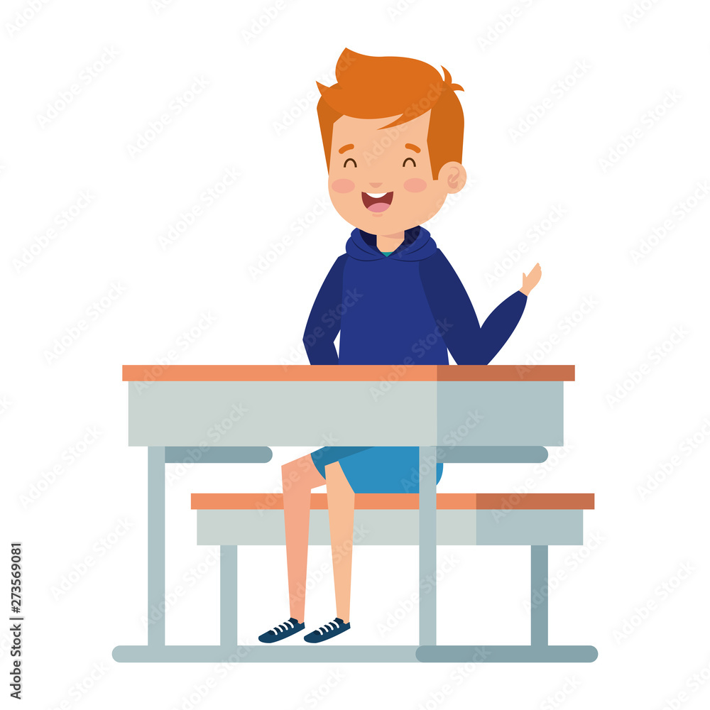 happy little student boy seated in school desk happy little student boy seated in school desk