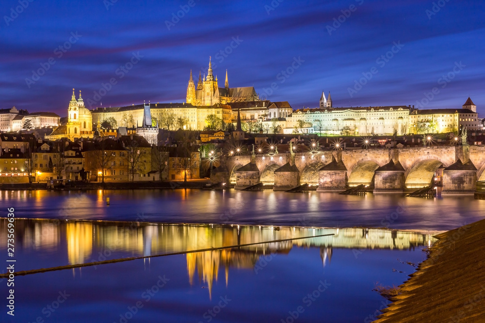 Panorama of Prague Castle and St. Vitus cathedral in twilight with dramatic sky. Prague, Czech Republic