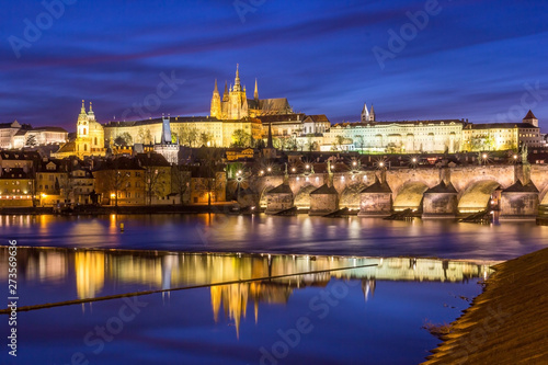 Panorama of Prague Castle and St. Vitus cathedral in twilight with dramatic sky. Prague, Czech Republic © navintar