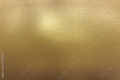 Scratches on gold metal wall, abstract texture background