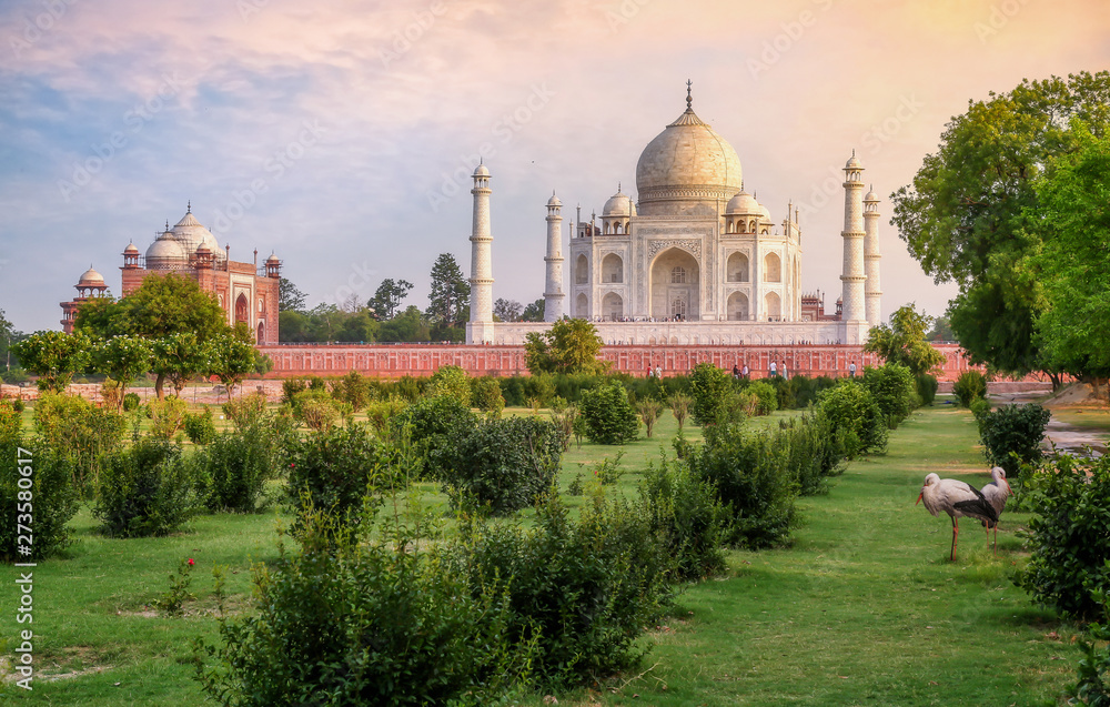 Taj Mahal historic monument at sunset as seen from Mehtab Bagh at Agra, India