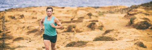 Run man fit active lifestyle running on sand hills outdoor in nature beach banner panorama. Sports and fitness people landscape.