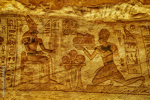 Stone Bas Relief Images Carved Into Wall at Luxor Temple in Aswan Egypt.