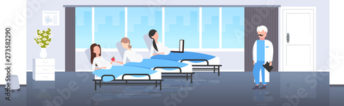male doctor examining pregnant women lying in hospital bed gynecology consultation pregnancy concept modern clinic interior flat full length horizontal