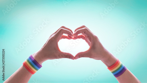 Εκτύπωση καμβά LGBT pride or LGBTQ+, LGBTQIA+, Gay pride with rainbow wrist band on hands in he