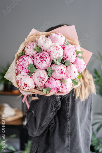 Wallpaper Mural Pink peonies in womans hands. Beautiful peony flower for catalog or online store. Floral shop concept . Beautiful fresh cut bouquet. Flowers delivery Torontodigital.ca