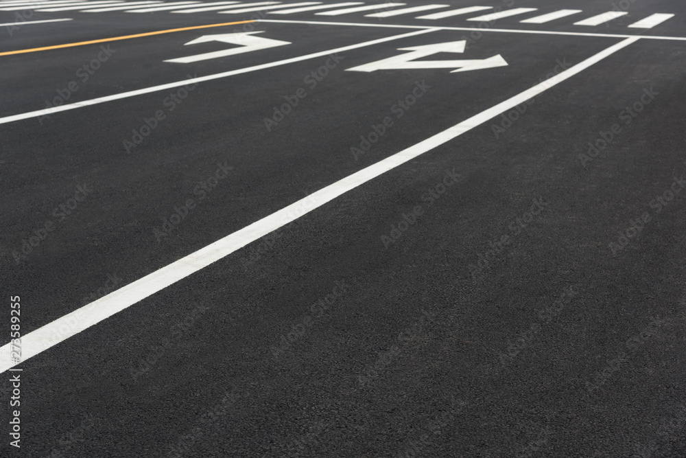 Urban asphalt pavement texture and road indication Urban asphalt pavement texture and road indication