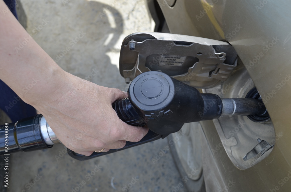 Obraz premium refueling machine with gasoline