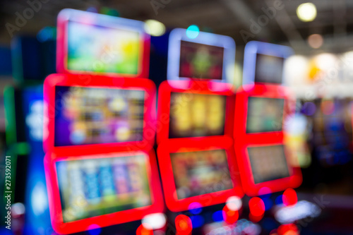 Fototapeta Naklejka Na Ścianę i Meble -  Blurred Slot machines in a casino