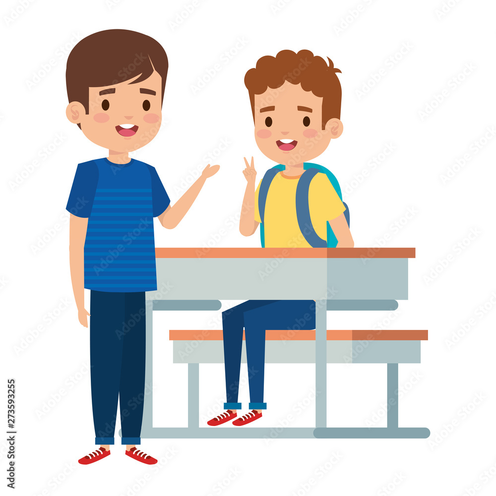 happy little students boys seated in school desk