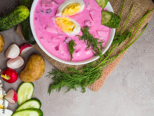 Fresh cold vegetable beetroot soup with cucumber, dill. Spring detox, diet, clean food. Holodnik. Rustic style. Selective focus photo