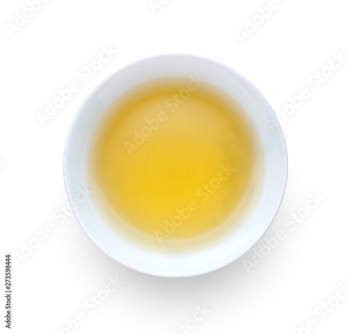 A cup of green tea isolated on white background. Top view.