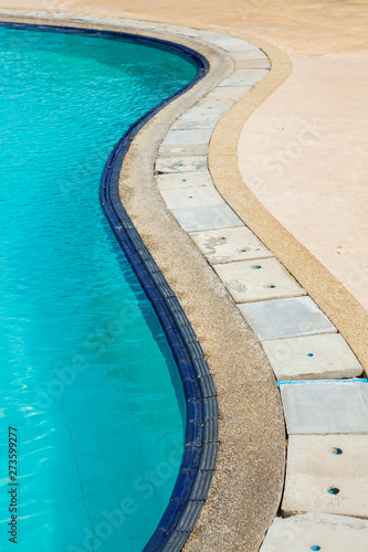 Swimming pool edge with ladder in home © wandee007