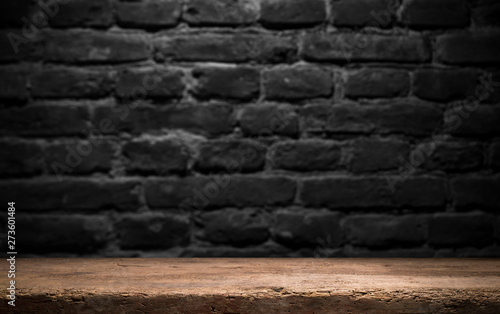 image of wooden table in front of abstract blurred background of resturant lights © kishivan