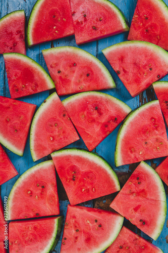 Wood surface with watermelon portions