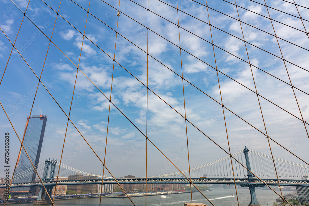 Fototapeta premium Manhattan Bridge over East river, New York city, view from Brooklyn bridge