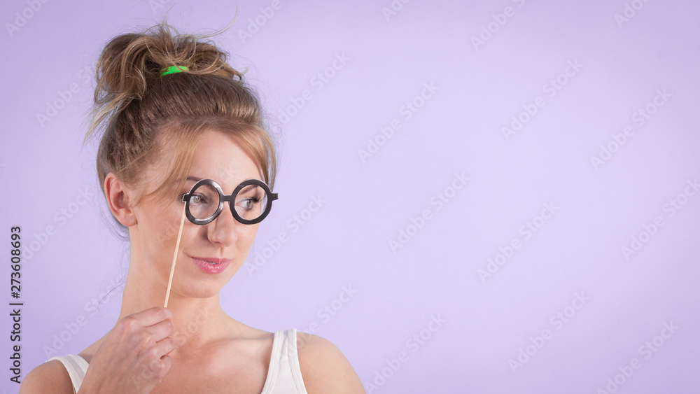 Elegant woman pretending wearing eyeglasses