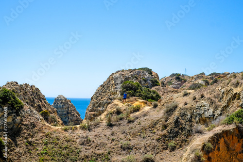 Coastal landscape in Portugal, Algarve coast, cliffs on the Atlantic coast © Lina