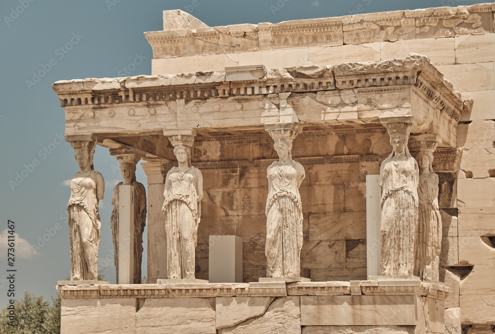 is a temple made from Pentelic marble located on the Acropolis area in a sunny day in the capital of Greece - Athens - travel destination concept