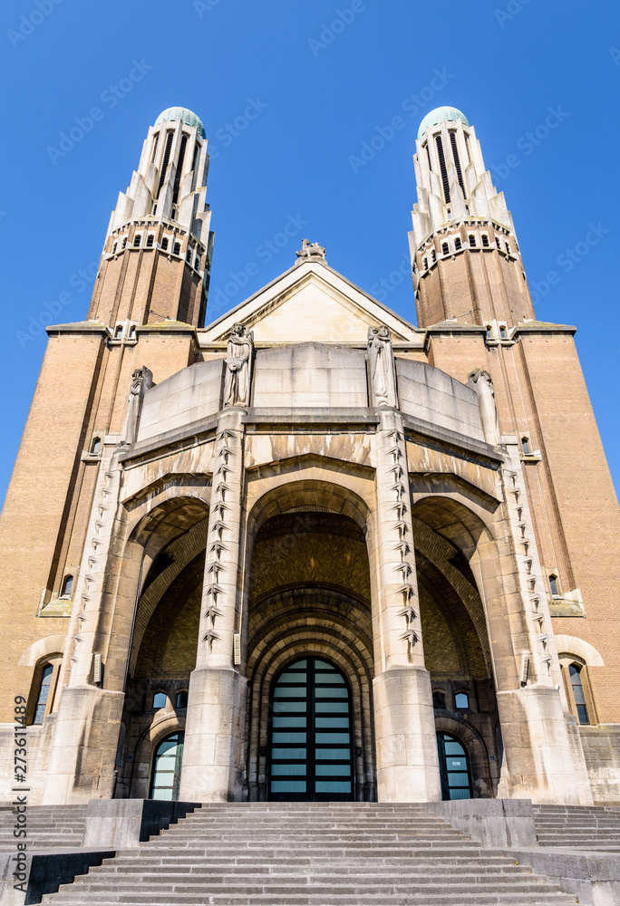 Fototapeta premium Low angle view of the portal of the National Basilica of the Sacred Heart, the fifth largest church in the world located in the Elisabeth park in Koekelberg, part of Brussels-Capital region, Belgium.