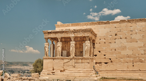 Temple of Athena Nike - Erechtheum located on the Acropolis area in a sunny day in the capital of Greece - Athens - travel destination concept