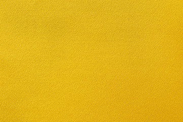 Yellow fabric texture background, seamless pattern of natural textile surface.