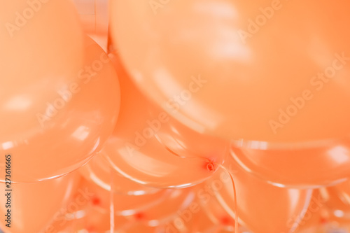 background of orange balloons close up