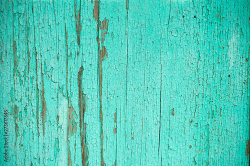 Grunge background. Peeling paint on an old wooden floor. Vintage wood background. Old Wood texture