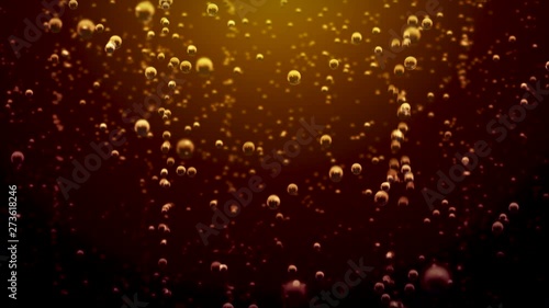 Transparent bubbles go up underwater over coca-cola background photo