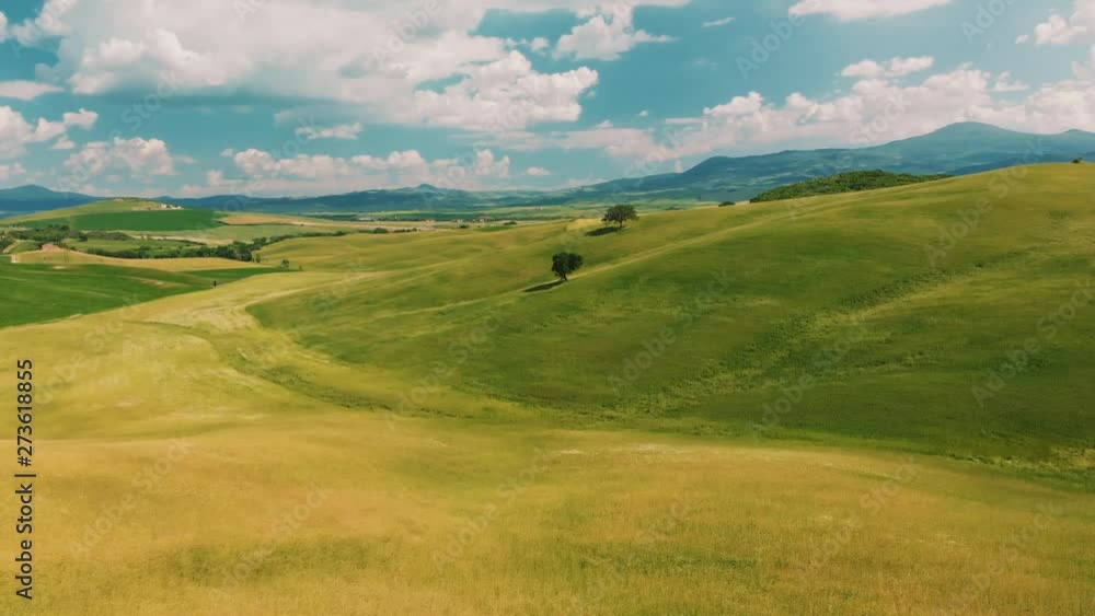 Beautiful aerial view of Tuscany Hills, Italy in spring. Beautiful aerial view of Tuscany Hills, Italy in spring.