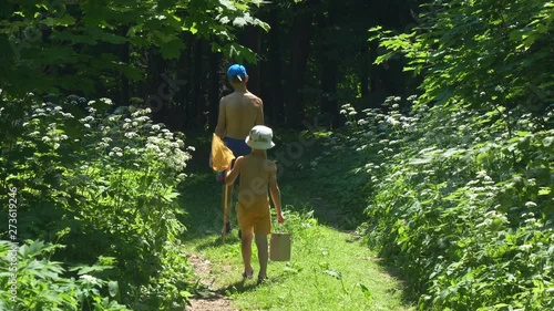 boys go fishing in the green in the summer