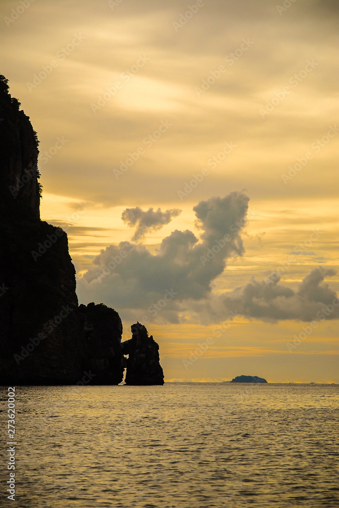 Silhouette of coastal mountain at sunset, near Maya Bay, Ko Phi Phi island, Phuket, Thailand