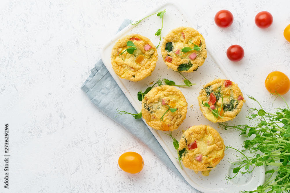 omelet with tomatoes and bacon, baked eggs with spinach and broccoli, top view with copy space, keto, ketogenic diet omelet with tomatoes and bacon, baked eggs with spinach and broccoli, top view with copy space, keto, ketogenic diet