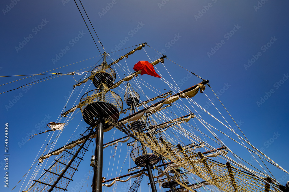 Low viewing angle of three masts of a sailing vessel. Low viewing angle of three masts of a sailing vessel.