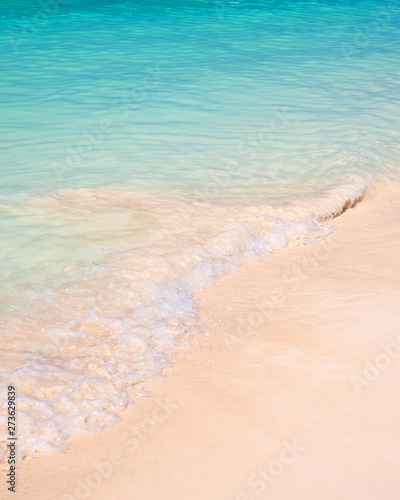 Fototapeta Naklejka Na Ścianę i Meble -  Sand and caribbean sea vertical background